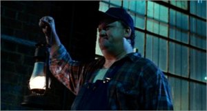 man carrying lantern